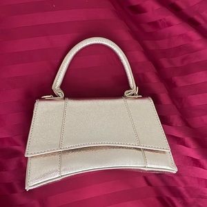 Light gold top handle purse